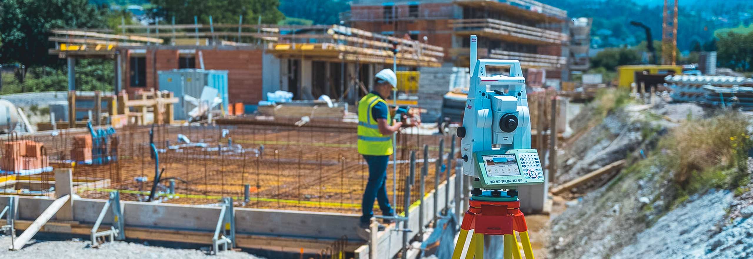Surveyor on site with Leica TS16 Total Station