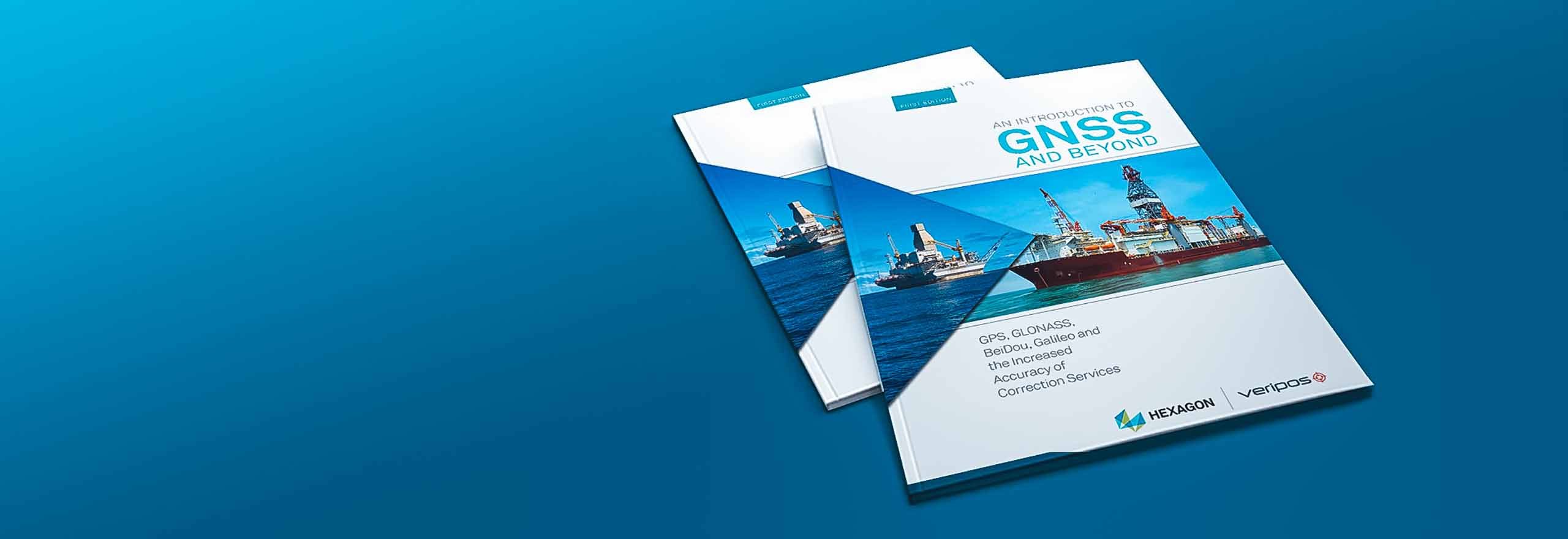 Hexagons Buch „Einführung in GNSS“ auf türkisfarbenem Hintergrund.